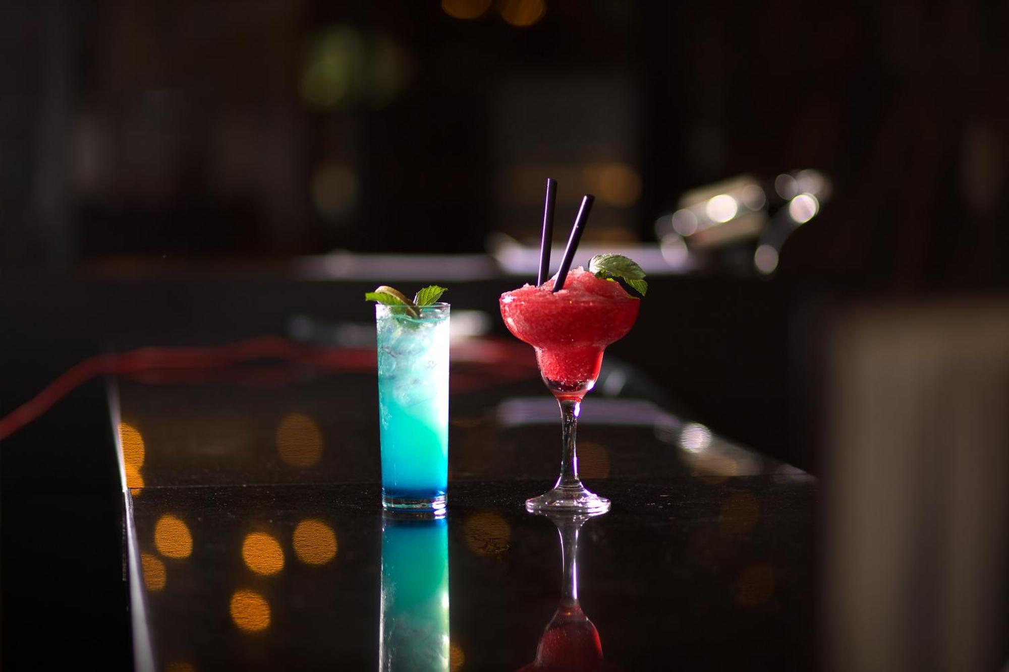 Ramada By Wyndham Istanbul Merter Εξωτερικό φωτογραφία A Blue Hawaii (left) and a strawberry margarita (right)